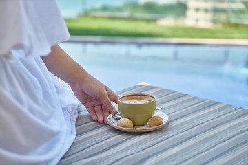 woman drinking a delicious coffee