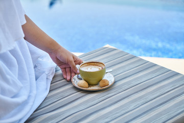 woman drinking a delicious coffee