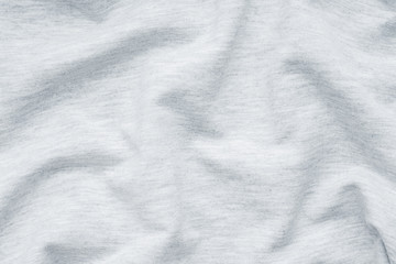 Fototapeta na wymiar Grey fabric texture. Background of clothing details.