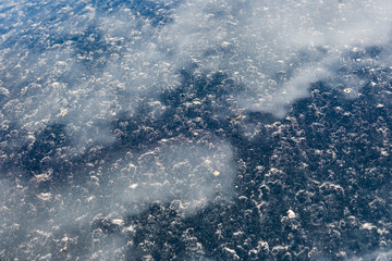 Beautiful texture, consisting of dirt on the hood and reflected clouds