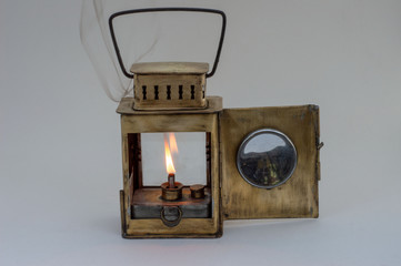 Old kerosene lamp from yellow brass.