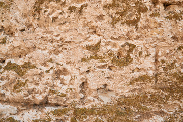 Fragment of the old wall made of the castle. Good weather