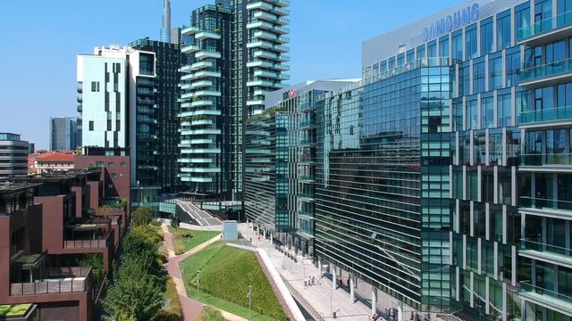 Milan, Italy, 09.04.2022: Aerial view of the promenade of Porta Nuova Varezine. Office buildings. Drone shooting. Modern houses made of glass and concrete. BNP Paribas Leasing Solutions building
