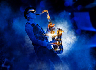 Blues.  Woman playing on saxophone