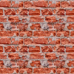 Seamless photo pattern of red broken bricks wall.