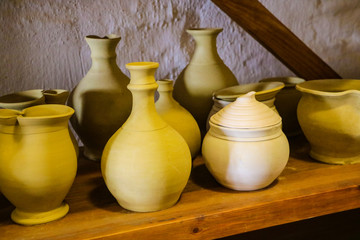 Fototapeta na wymiar Vases and pottery vessels decorative craft products made of clay and natural ceramic materials.