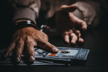 The suspect was arrested at the investigation, interview to find out the truth, the thief was caught by the police come to the dark room,Thailand people,Pay for corruption.