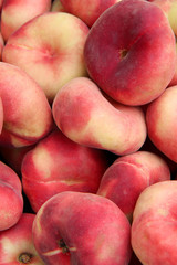 Fototapeta na wymiar Delicious juicy ripe fig peaches background.