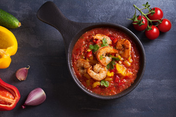 Shrimp Gazpacho with Roasted Red and Yellow Bell Peppers. Spanish soup. View from above, top studio...