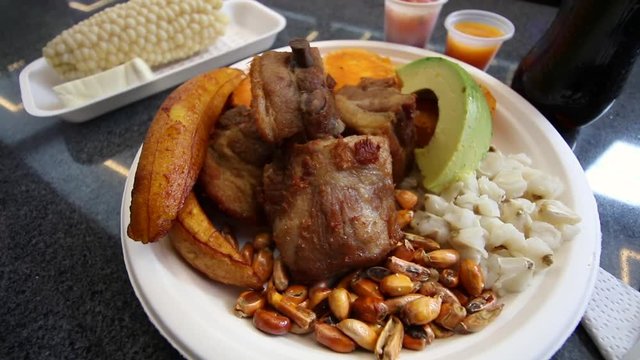 fried pork with roasted beans avocado corn