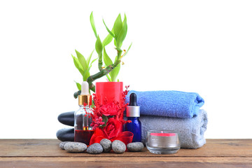 Beautiful composition of spa treatment with red candle. SPA concept