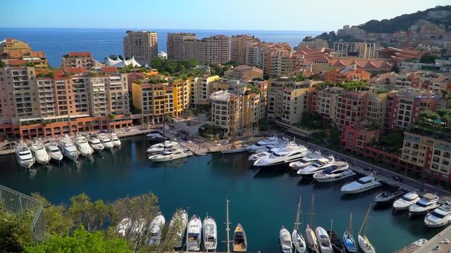 Aerial view of the famous city on the Mediterranean Sea Luxury yacht moored in the bay, Marina port, yacht club. panorama of the European landscape from above MONTE CARLO