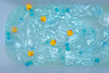 Plastic bottles and yellow rubber ducks