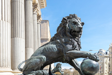 Lion statue at the entrance of the Spanish Parliament (Congreso de los Diputados), Madrid, Spain