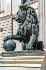 Lion statue at the entrance of the Spanish Parliament (Congreso de los Diputados), Madrid, Spain