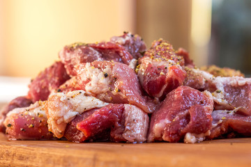 Meat, chopped in large pieces, with spices_