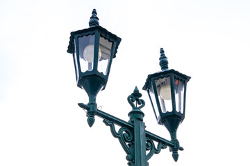 Fototapeta na wymiar street lamp on blue background