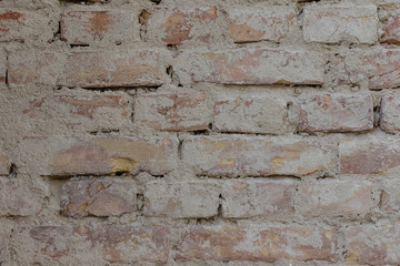 wall of old light brick
