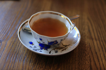 Cup of tea on wooden table