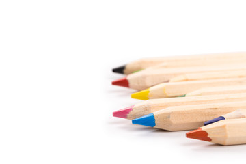Wooden colorful ordinary pencils isolated on a white background