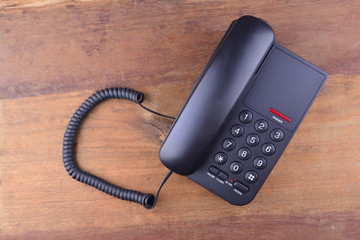 Black Telephone on wooden table