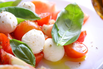 Italian caprese salad with tomatoes and mozzarella