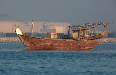 Traditonal fishing boat of Bahrain also called as Dhow moving in sea