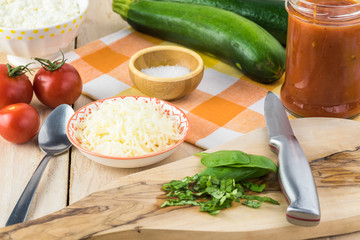 Zucchini rollups with cheese in marinara sauce.