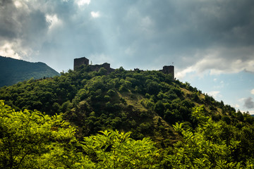 Ruins of medieval fortress Maglic on top of hill by the Ibar river in Serbia. Valley of this river is also called Lilac valley.