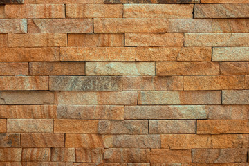 Brick wall made of natural stone.