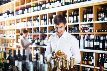 Man choosing bottle of wine