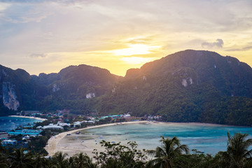 Wonderful sunset on Phi Phi Don island view point. Beautiful landscape with tropical sea lagoon.