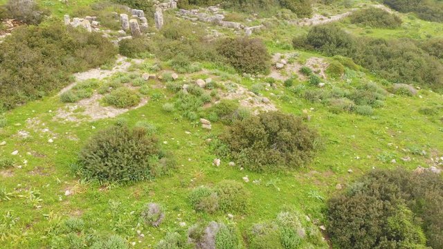 The ruins of the late Hellenic Jewish settlement Hurvat Sumak on Mount Carmel, Israel. View from the drone.