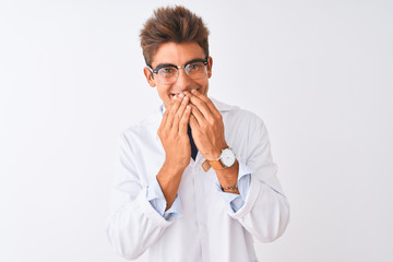 Young handsome sciencist man wearing glasses and coat over isolated white background laughing and...