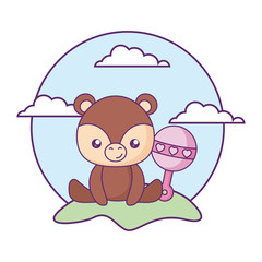 cute little bear baby with jingle bell in landscape