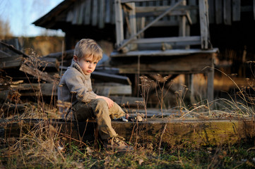 Little boy playing outdoor, concept of child imagines