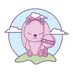 cute little bunny baby with jingle bell in landscape