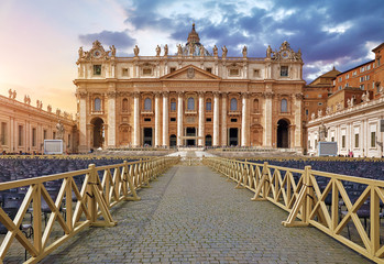 Fototapeta premium Front View St Peters Basilica. Panorama Square, Front view at entrance. Dramatic sky with clouds.