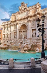 Washable wall murals Rome Trevi Fountain in Rome, Italy. Ancient fountain. Roman statues at piazza in old medieval city among traditional italian houses and street lamps. Famous landmark. Touristic destination for vacation.