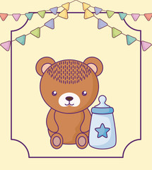 cute little bear baby with bottle milk and garlands hanging