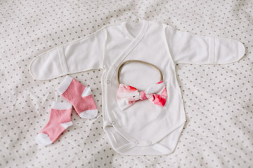 Top view fashion trendy look of baby clothes, fashion concept.  