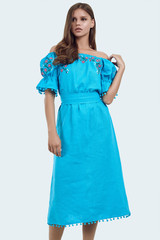 Beautiful female model with juicy lips posing in fashion dress