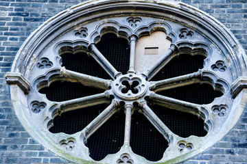 A rare example of a naturalistic ten-part rose window in Abney Park Cemetery church. The church is the oldest non denominational church in Europe and one of London's magnificent seven graveyards.