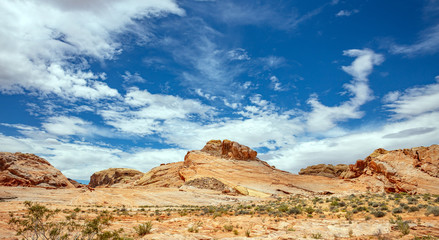 Valley of fire state park, Nevada USA. Red sandstone formations, blue sky with clouds