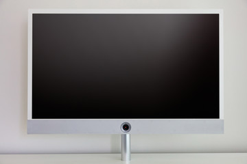 TV flat screen blank on wall background, copy space