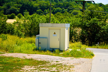 transformer house of the electricity supplier on a country road