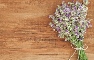 Lavender flower bouquet on wood table