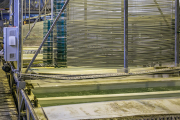 Pickling aluminium parts to remove oxide cover in tanks with etching acid in galvanic workshop
