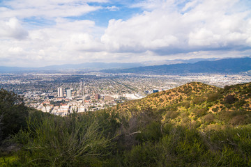 Fototapeta na wymiar Beautiful view of Los Angeles city from Hollywood Hills and Sunset Blvd