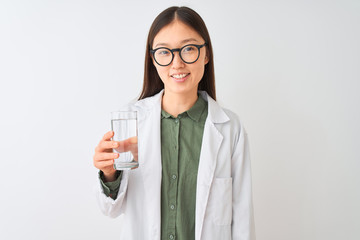 Young chinese dooctor woman wearing glasses drinking water over isolated white background with a happy face standing and smiling with a confident smile showing teeth